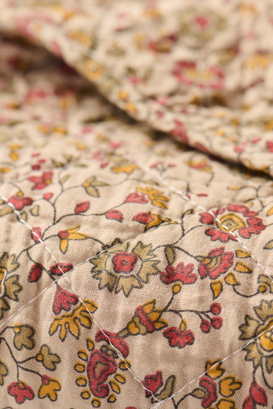 Plaid marron avec vignes de fleurs rouges, oranges et grises