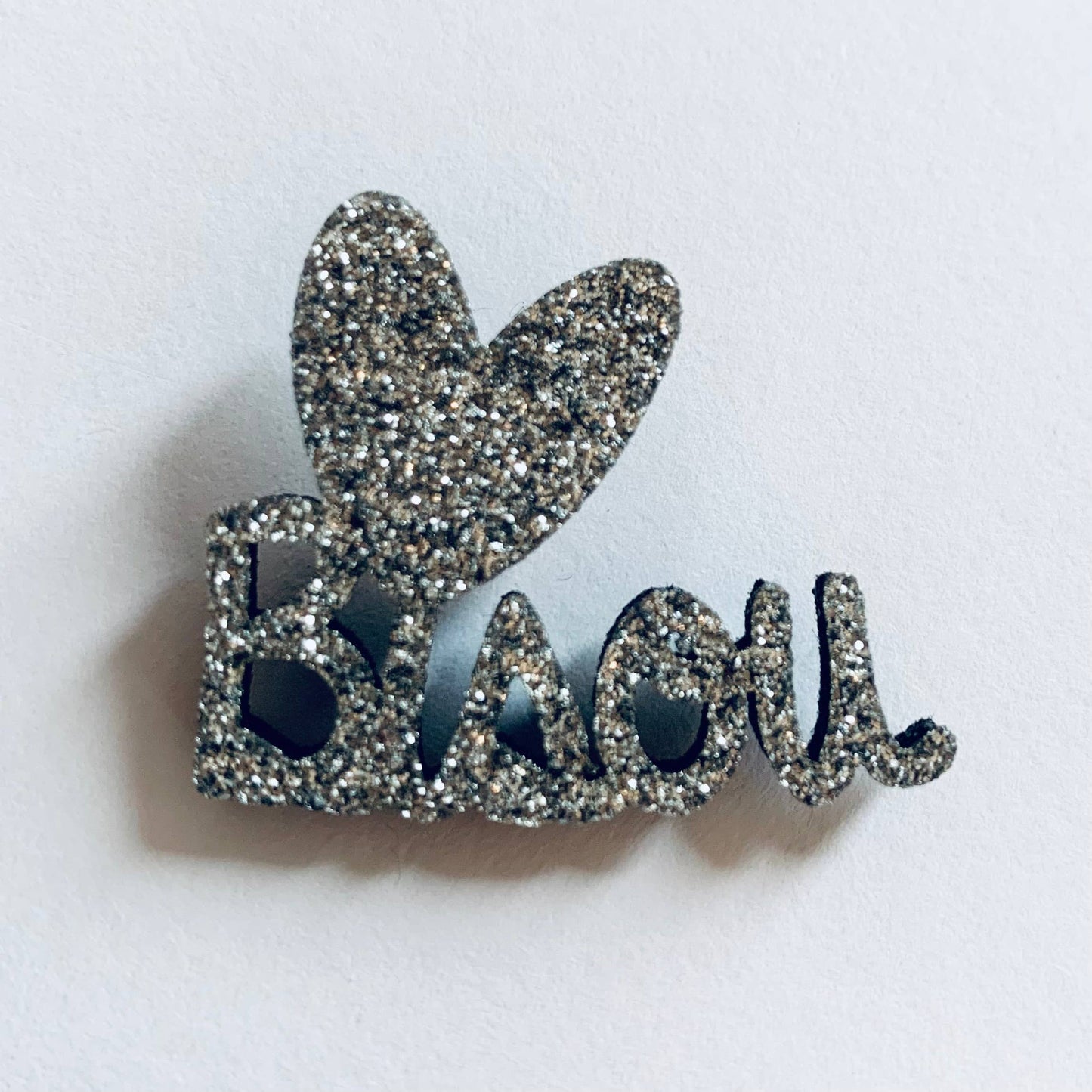 Pin's en paillettes - Bisou