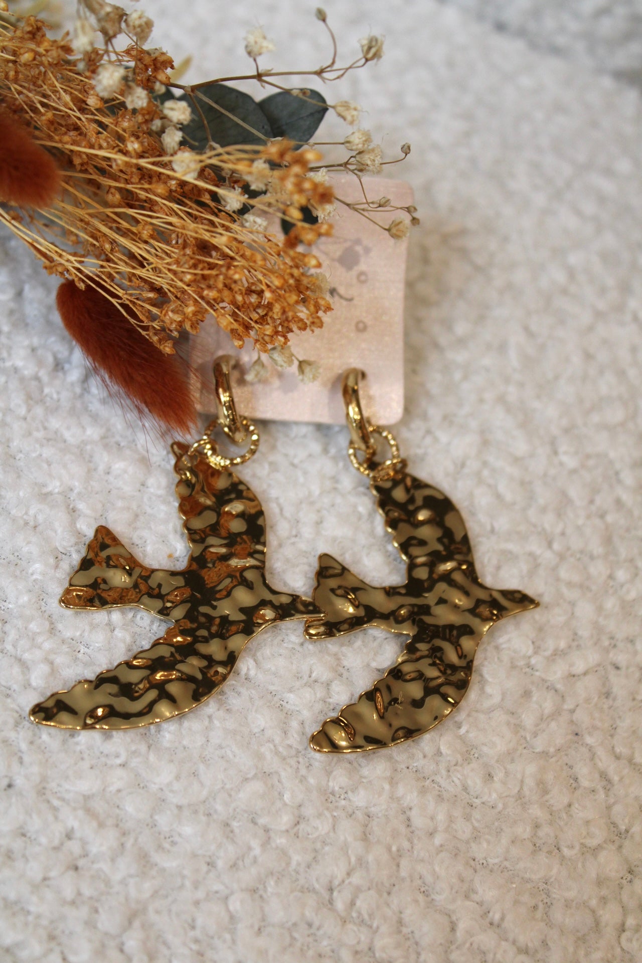 Créoles - grand oiseau en acétate doré