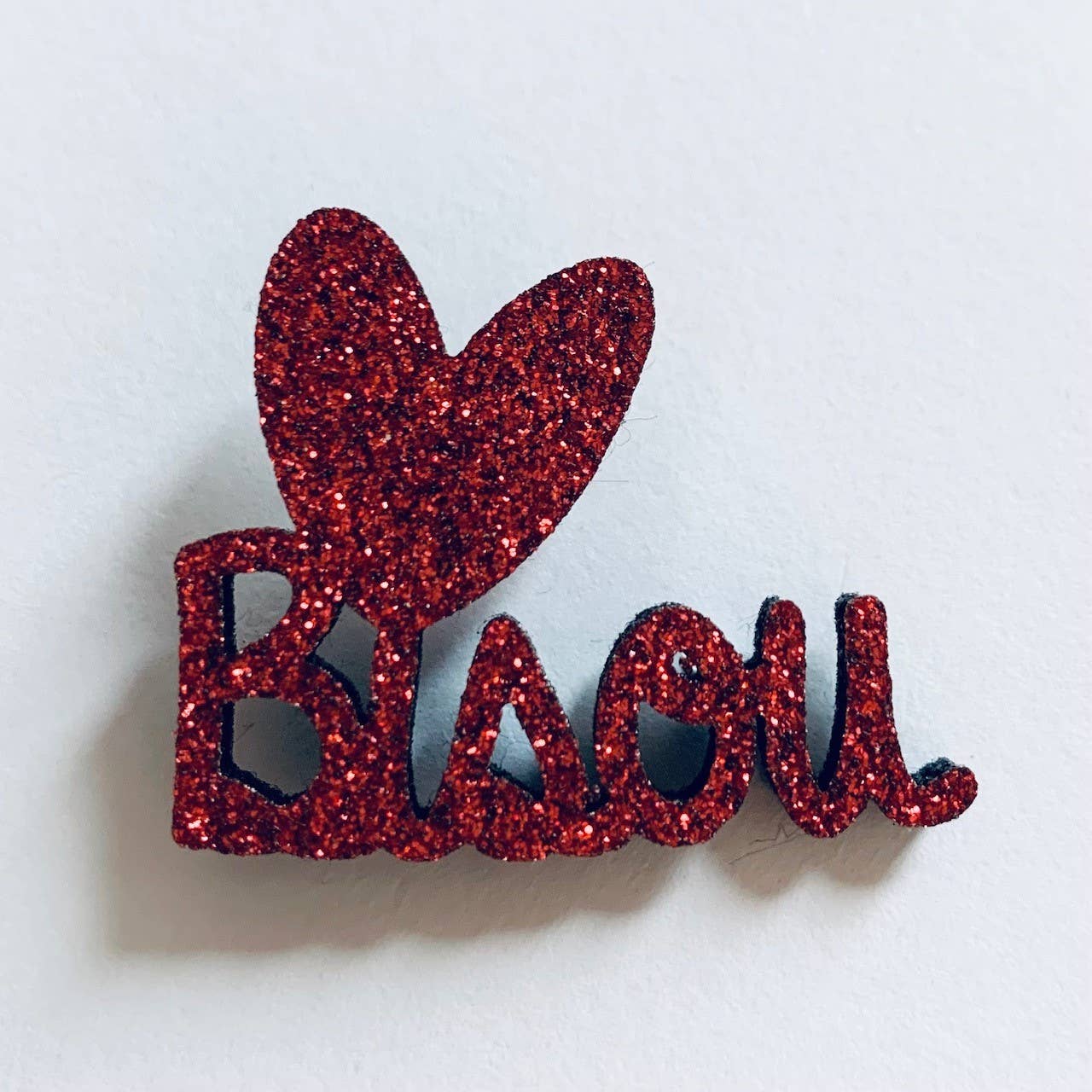 Pin's en paillettes - Bisou