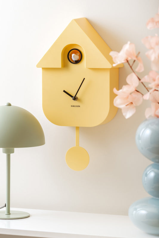 Horloge murale coucou moderne jaune pâle