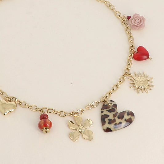 Collier - perles en céramique, coeurs léopard, texturé, en résine, soleil et fleur